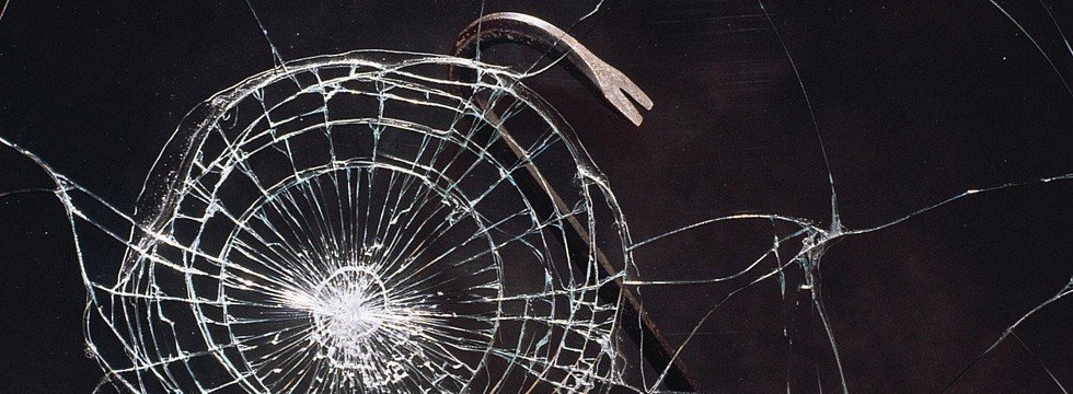 Cracked glass illustrating the type of breakage safety film is intended to retain